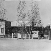 pho005094 From the Nye County, Nevada Photograph Collection (PH-00221) -- Series III. Beatty, Nevada -- Subseries III.B. Lisle Family. A bar stood to the left of the...